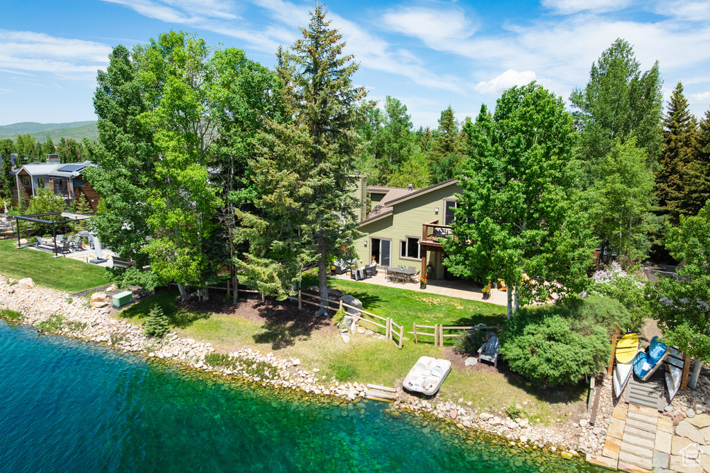 View of subject property with a nearby body of water