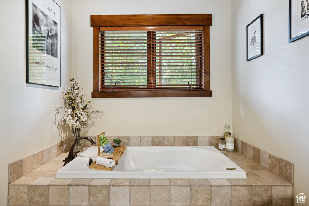 Full bath with a bath