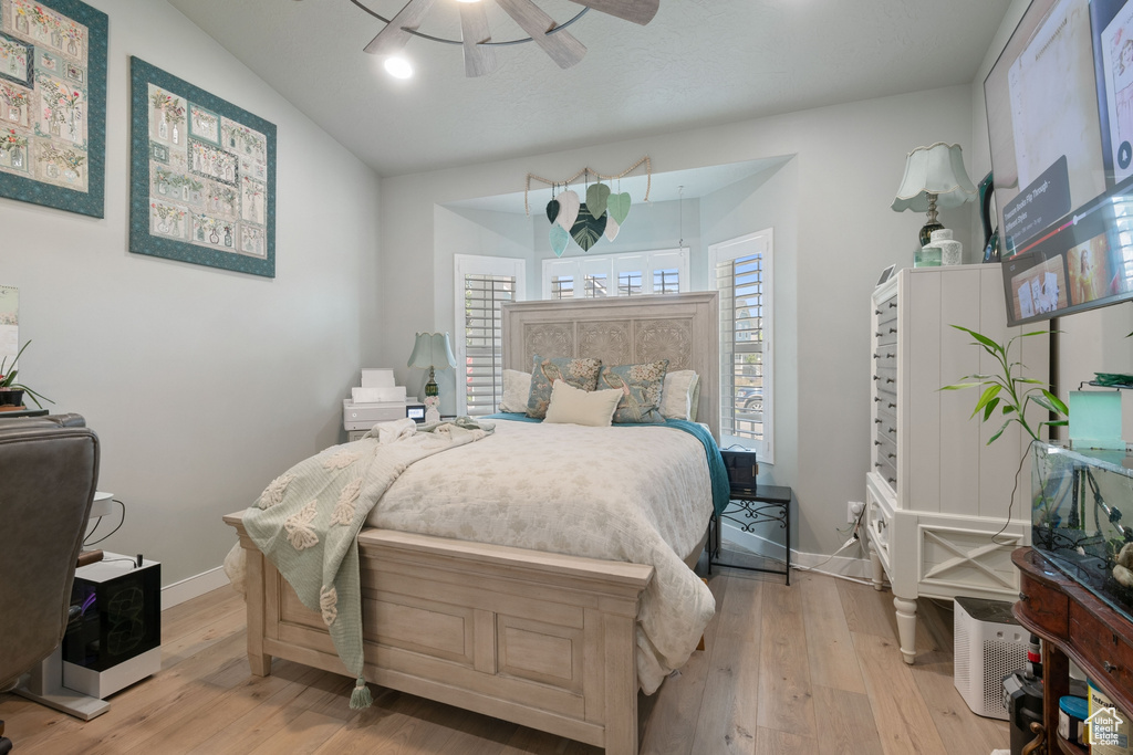 Bedroom with light wood-type flooring and ceiling fan