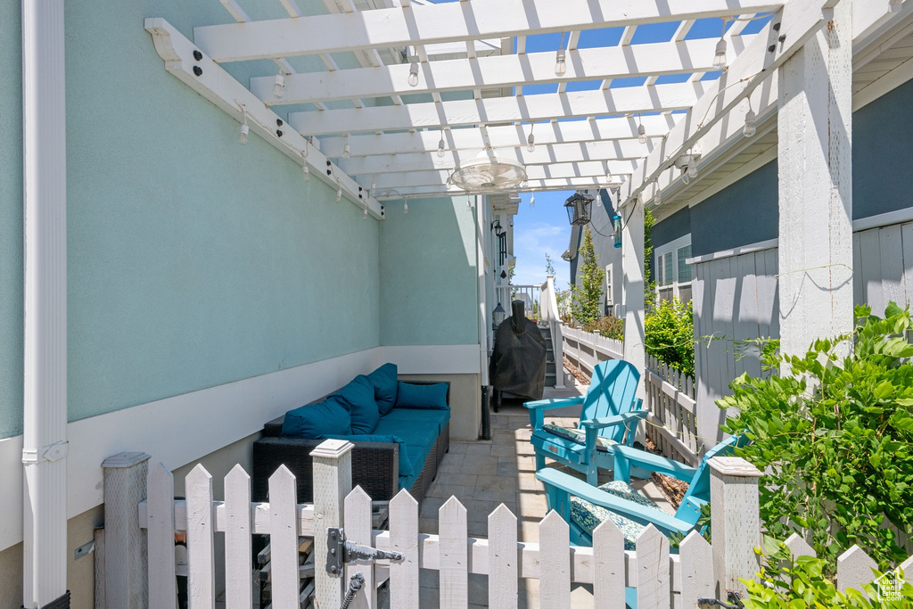 View of patio featuring a pergola