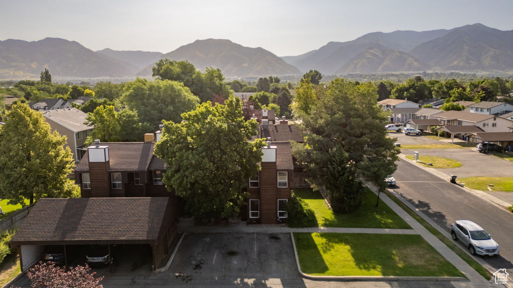 View of mountain background featuring nearby suburban area