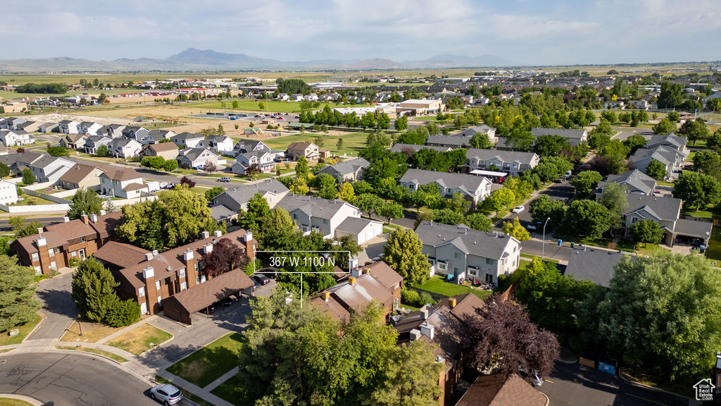 Aerial perspective of suburban area featuring mountains