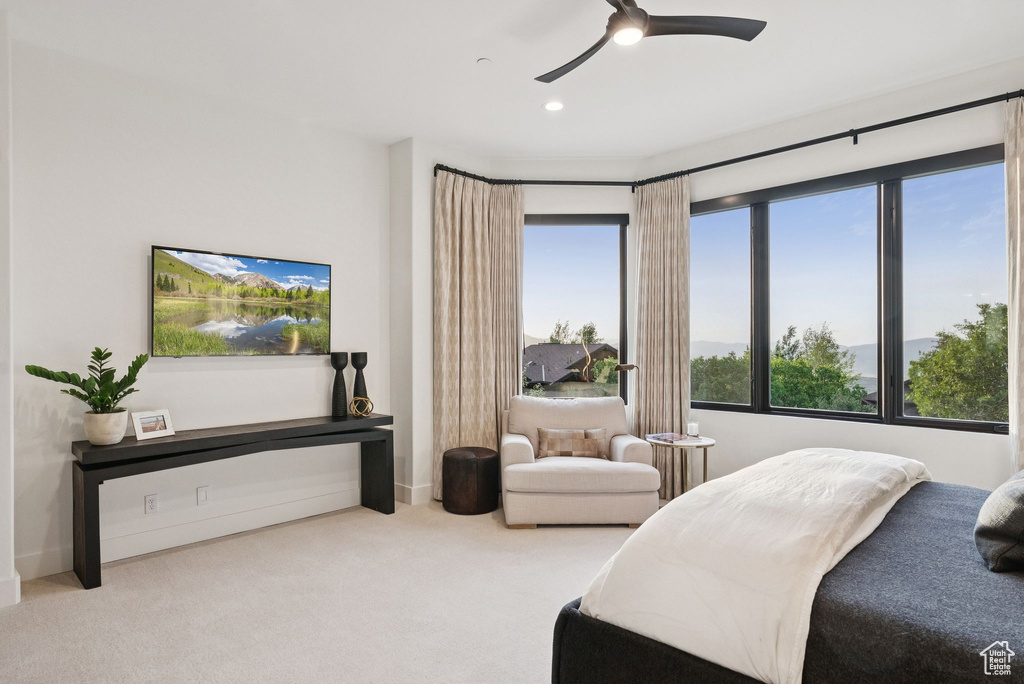 Bedroom featuring carpet flooring and a ceiling fan