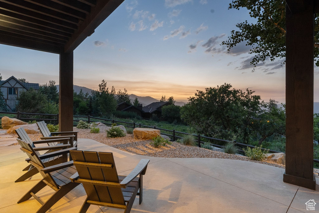 Patio terrace at dusk with a patio area