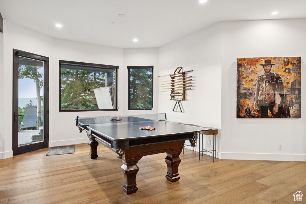 Playroom featuring light wood-type flooring and recessed lighting