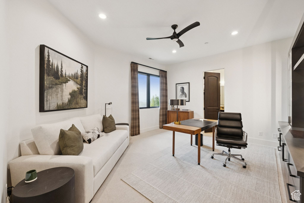 Home office with ceiling fan, recessed lighting, and light carpet
