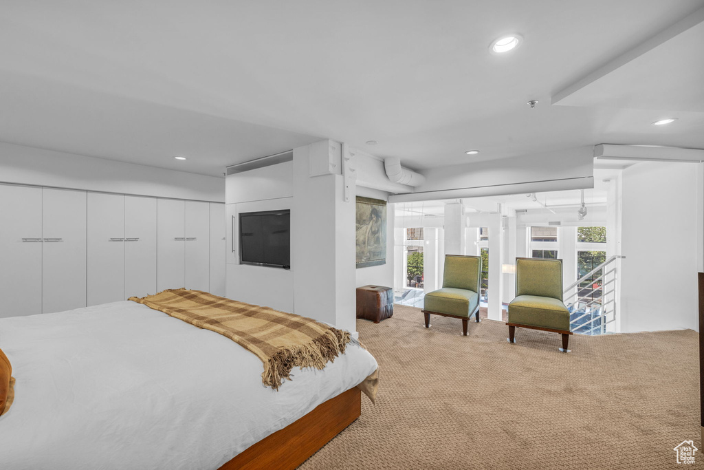 Carpeted bedroom featuring recessed lighting