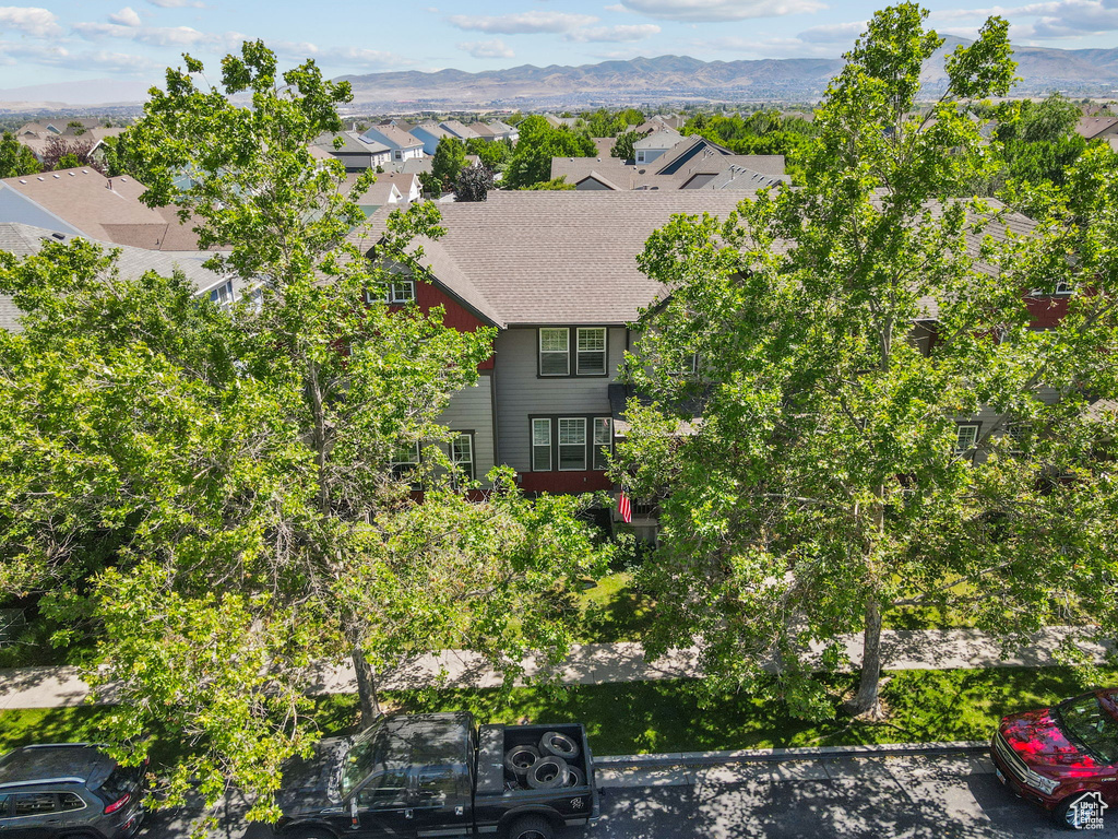Aerial view of residential area with a mountainous background