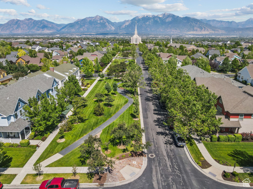 Aerial view of residential area featuring a mountain backdrop