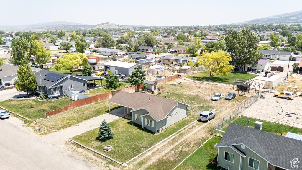 Aerial view of residential area with a mountainous background