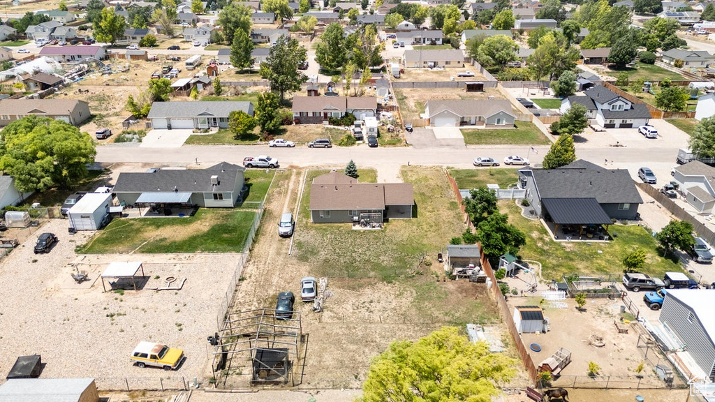 Aerial overview of property's location with nearby suburban area