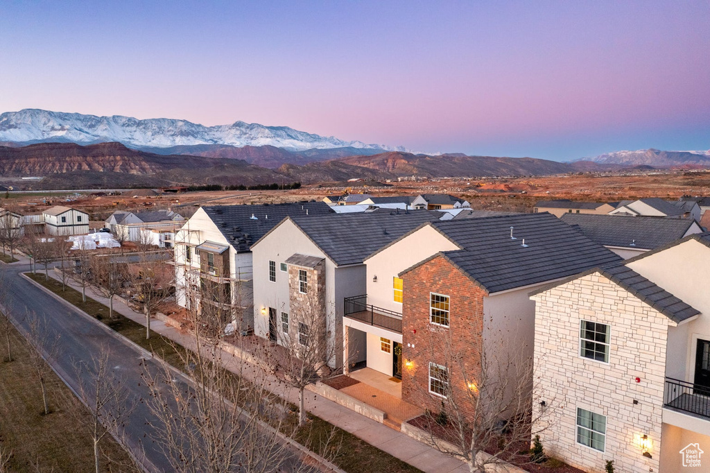 Aerial view of residential area featuring mountains