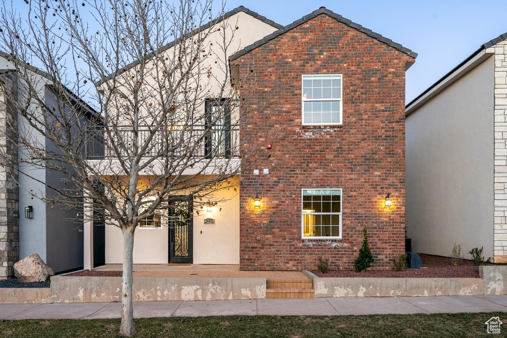 View of front of home with brick siding