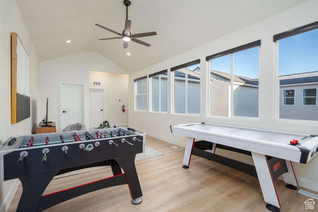Playroom featuring light wood finished floors, a ceiling fan, lofted ceiling, and recessed lighting