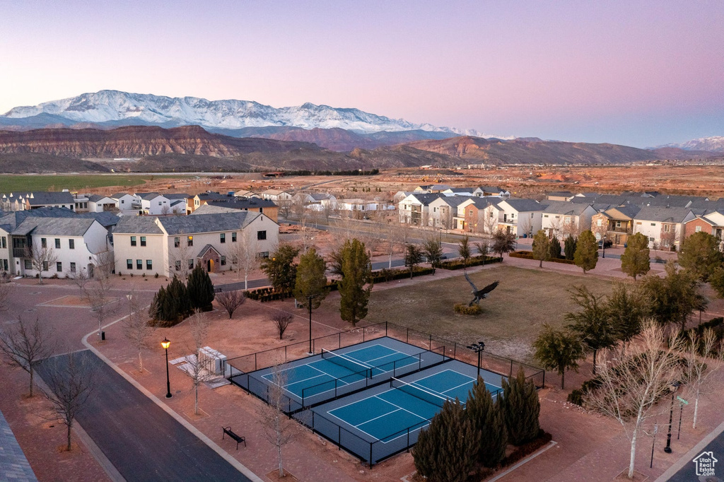 Aerial view at dusk of a residential view and a mountain view