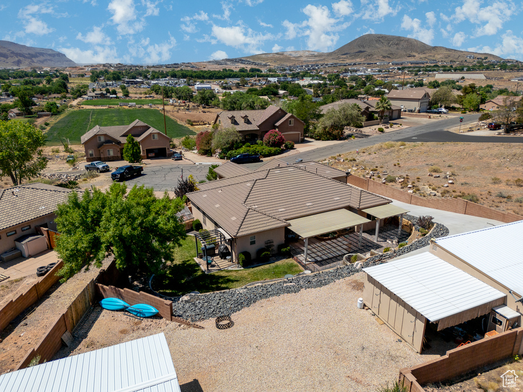 Aerial view of residential area with a mountain backdrop