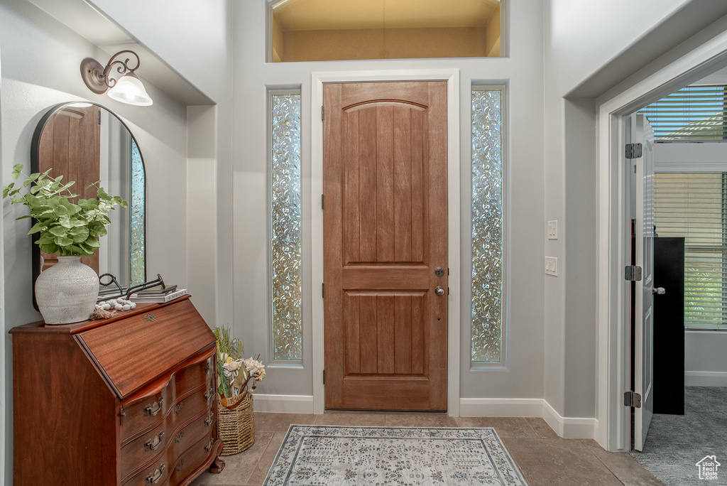 Foyer entrance featuring healthy amount of natural light