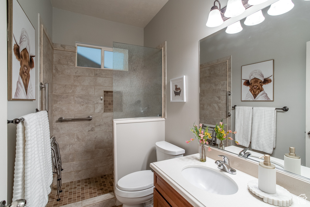 Full bathroom with vanity and walk in shower