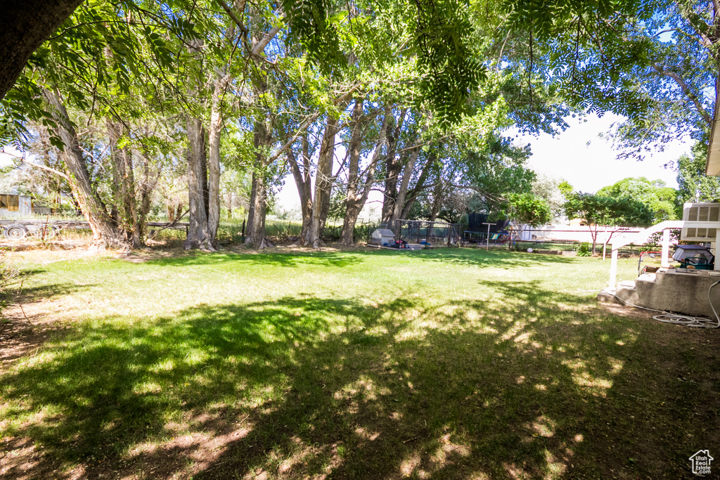 View of fenced backyard