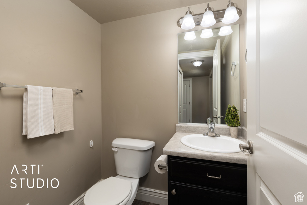 Bathroom with vanity and toilet