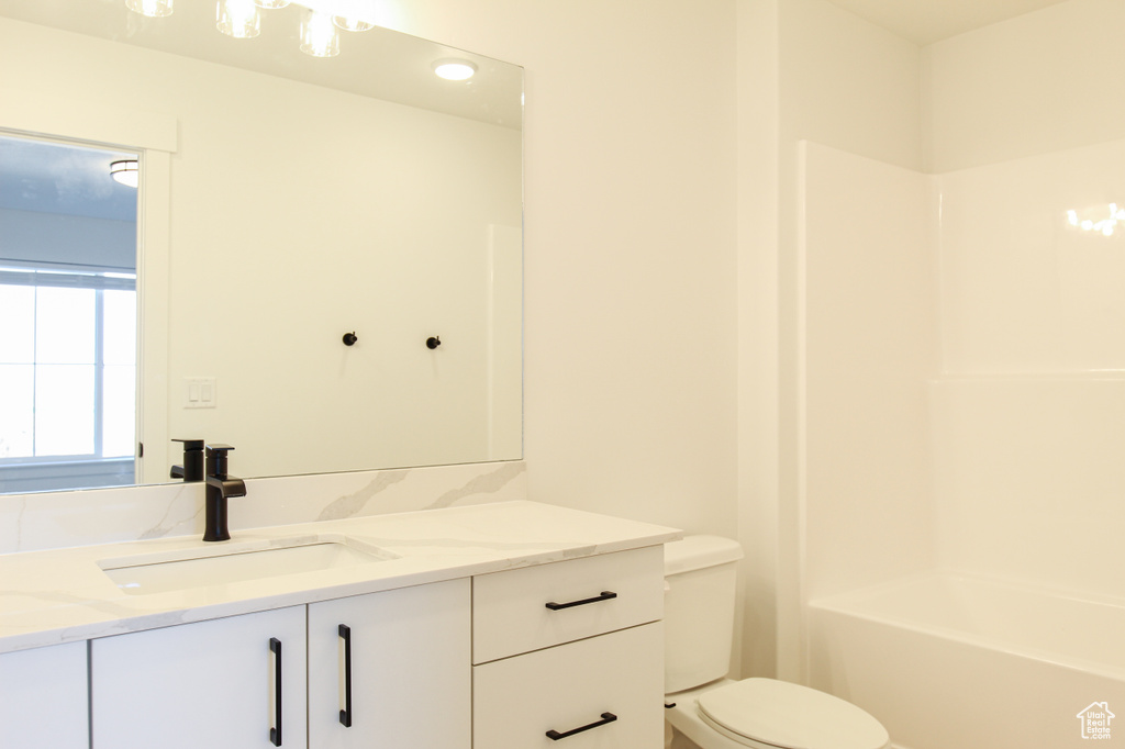 Full bathroom featuring vanity and shower / bath combination