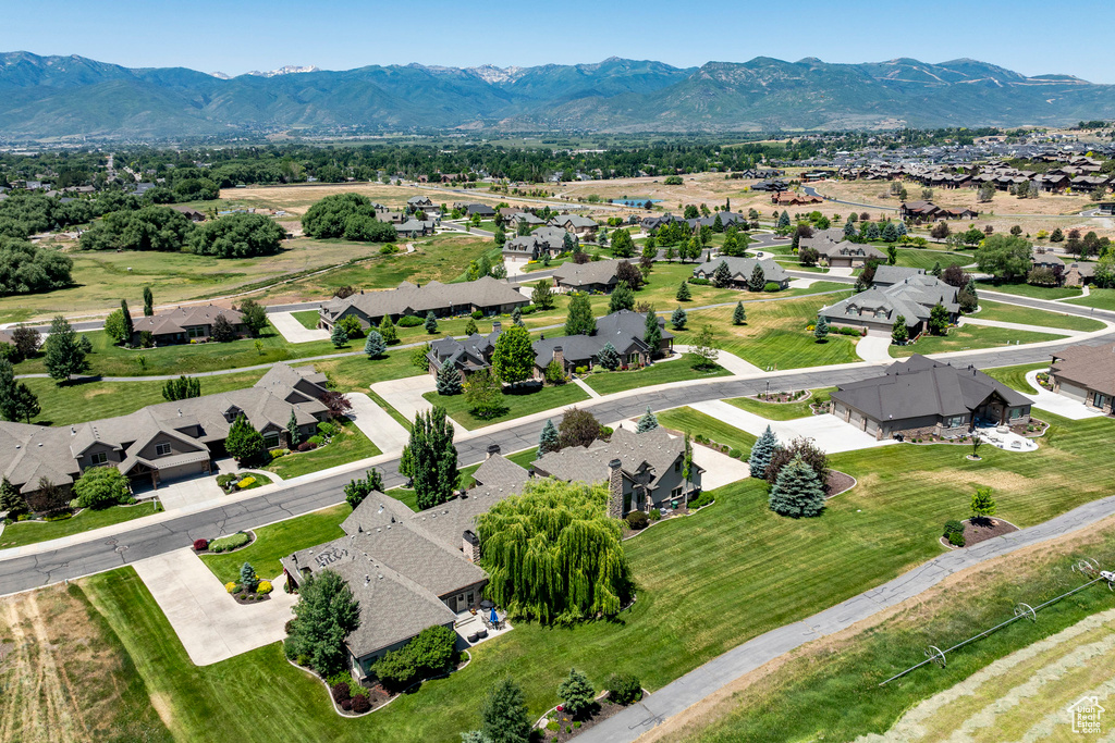 Aerial view of residential area with a mountain backdrop