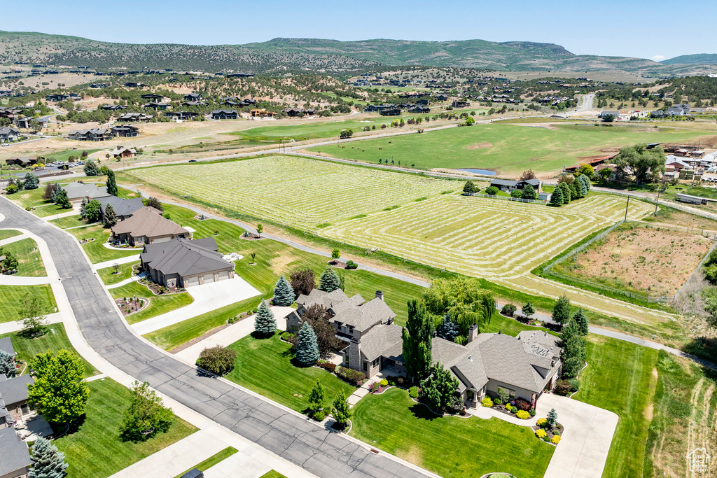 View of property location with nearby suburban area