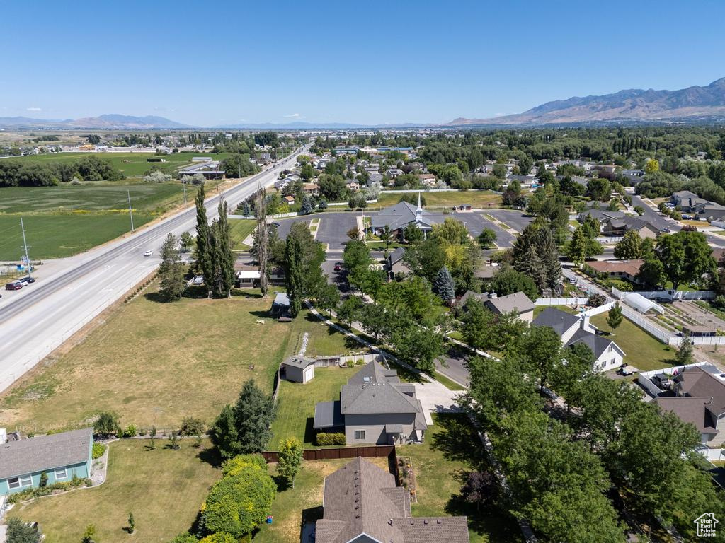 View of property location with mountains and nearby suburban area