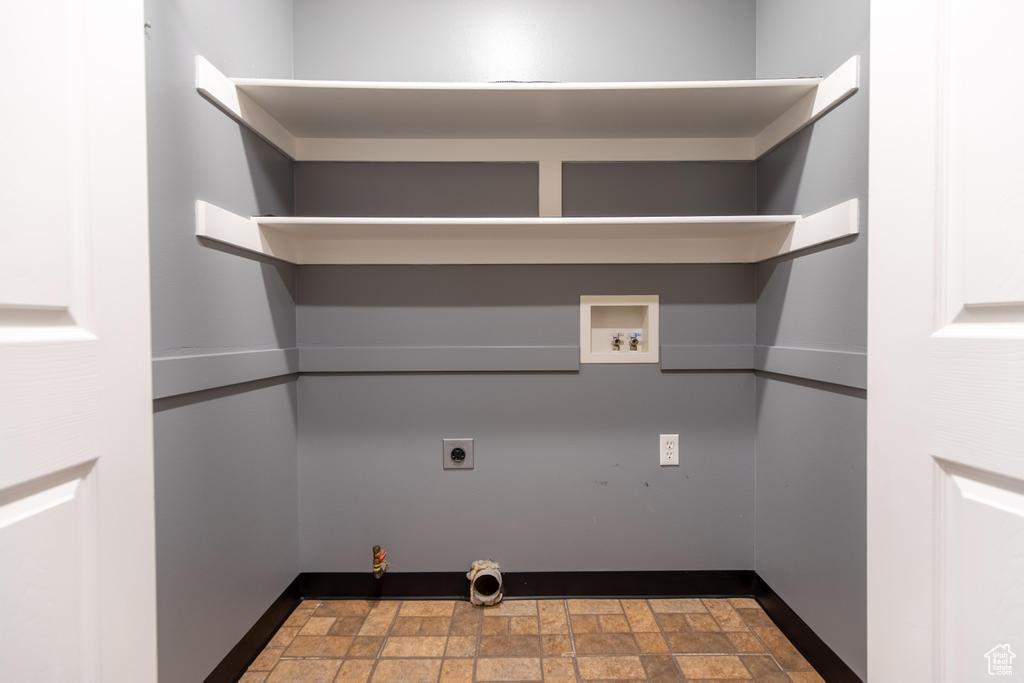 Laundry room with hookup for a gas dryer, washer hookup, and hookup for an electric dryer