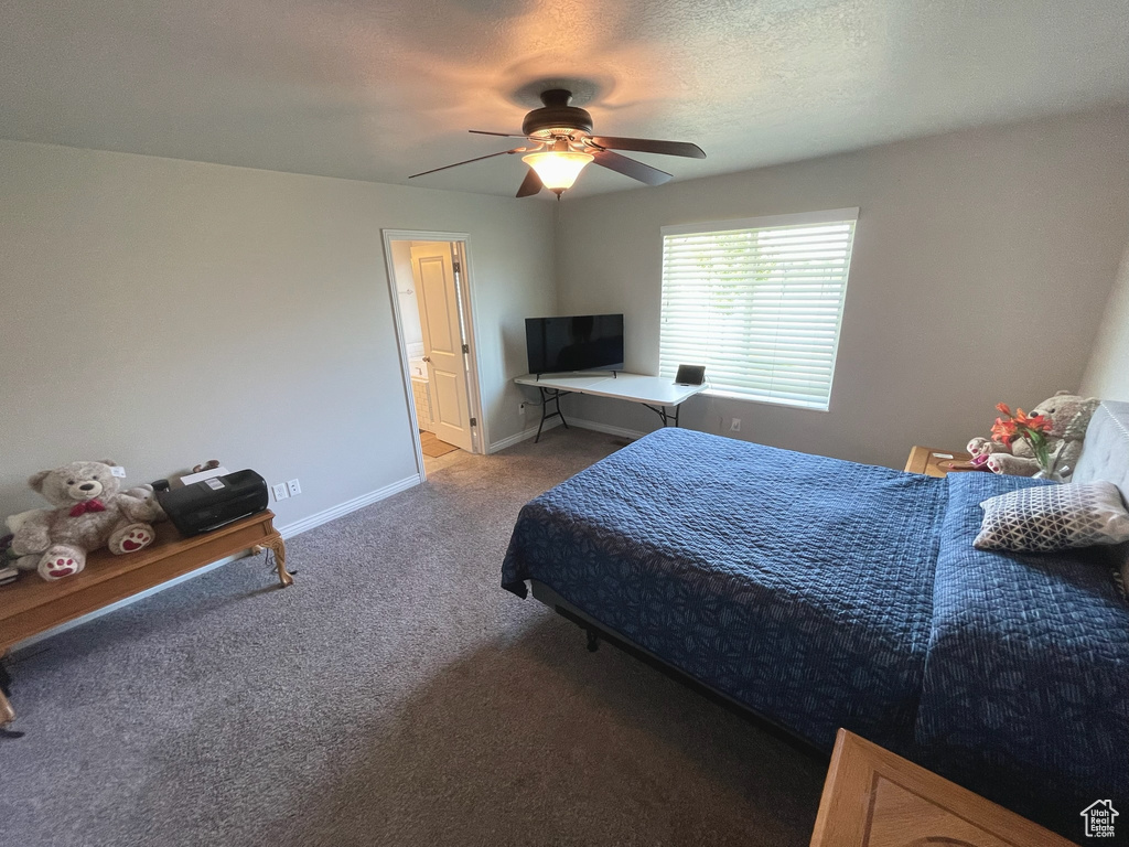 Bedroom featuring carpet floors and ceiling fan