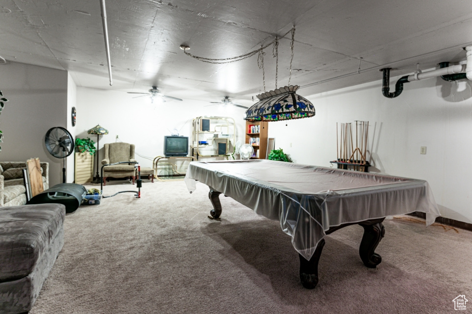 Rec room featuring carpet floors, a ceiling fan, and billiards table