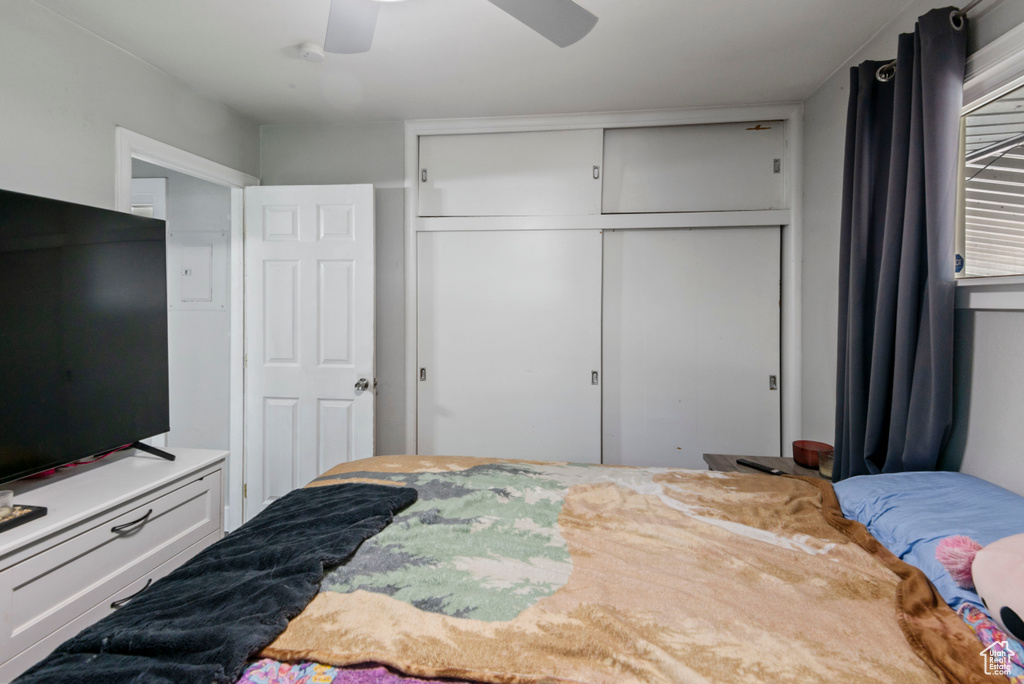 Bedroom with a closet and ceiling fan