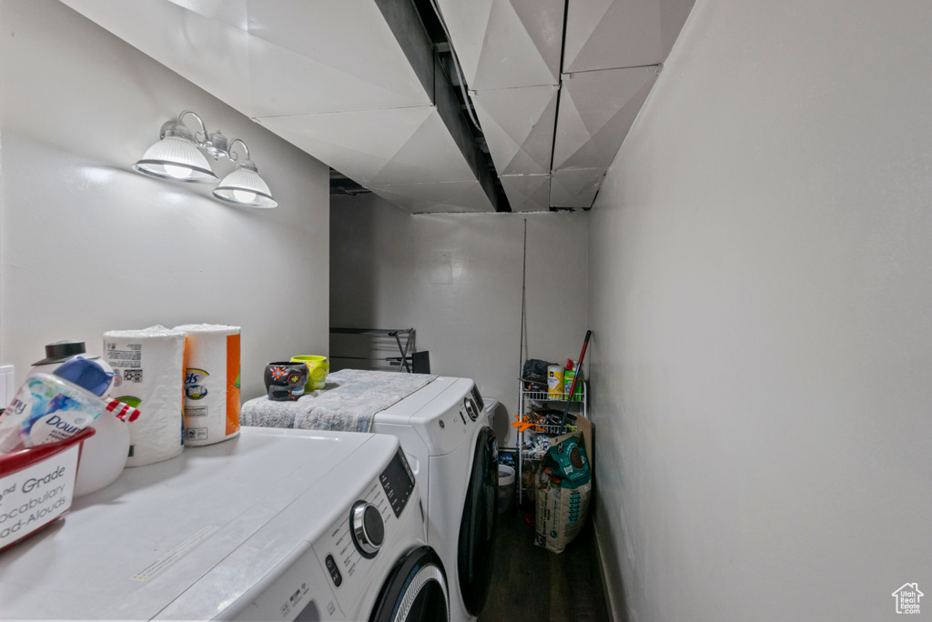 Laundry area featuring separate washer and dryer