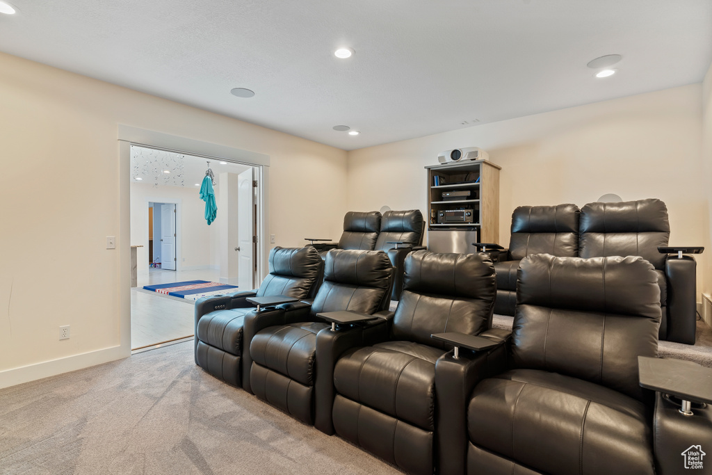 Cinema with carpet and recessed lighting