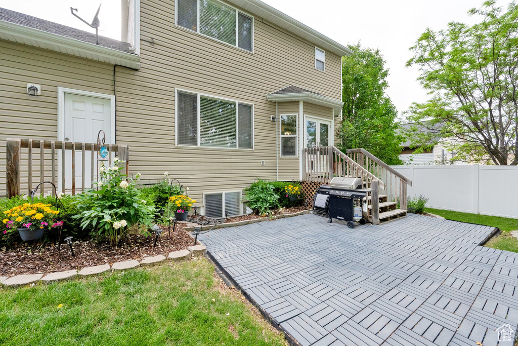 Rear view of house with a patio