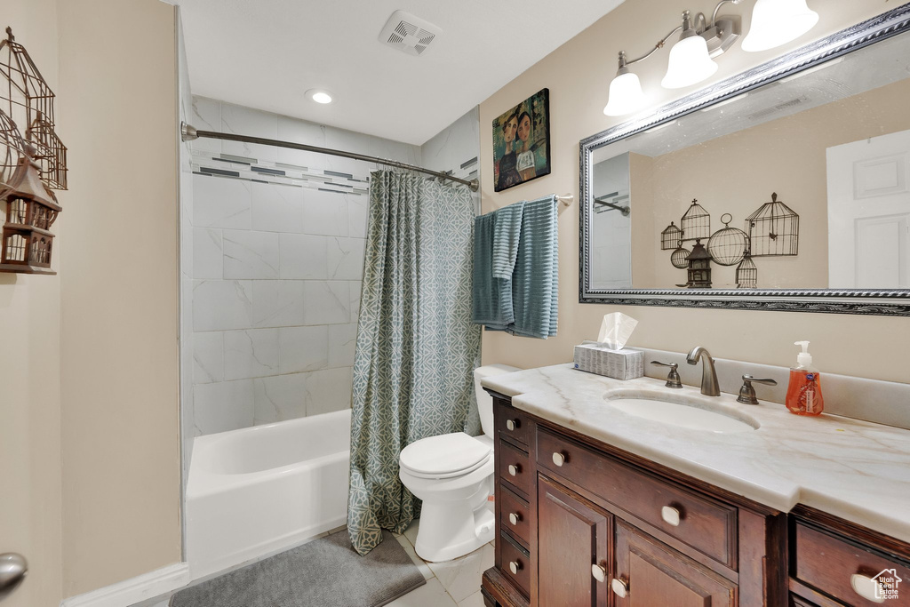 Full bath with vanity, shower / bathtub combination with curtain, tile patterned floors, and recessed lighting