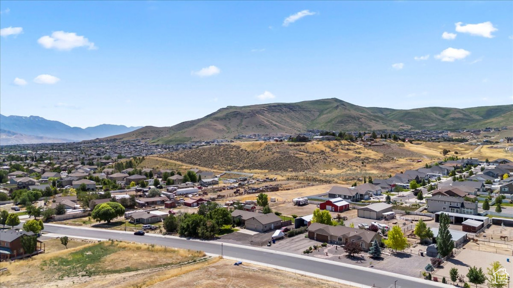 View of mountain background featuring nearby suburban area