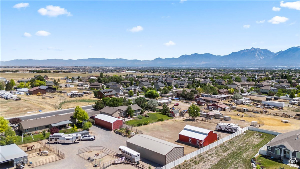 Aerial perspective of suburban area with a mountain backdrop