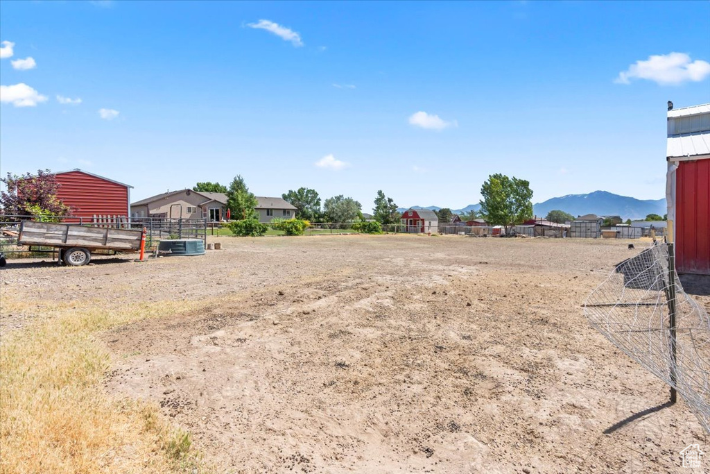 View of yard with a mountain view