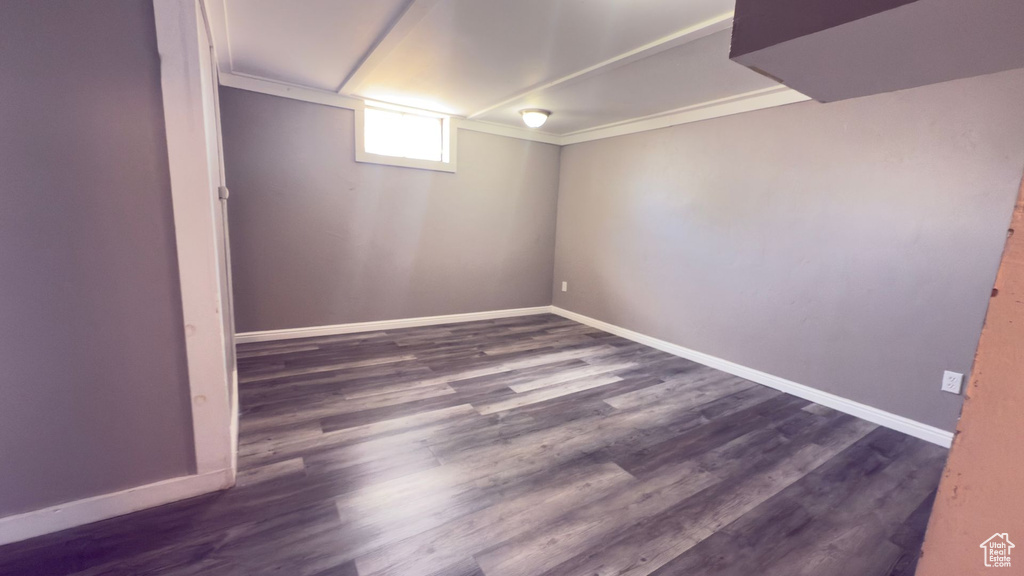 Below grade area featuring wood finished floors