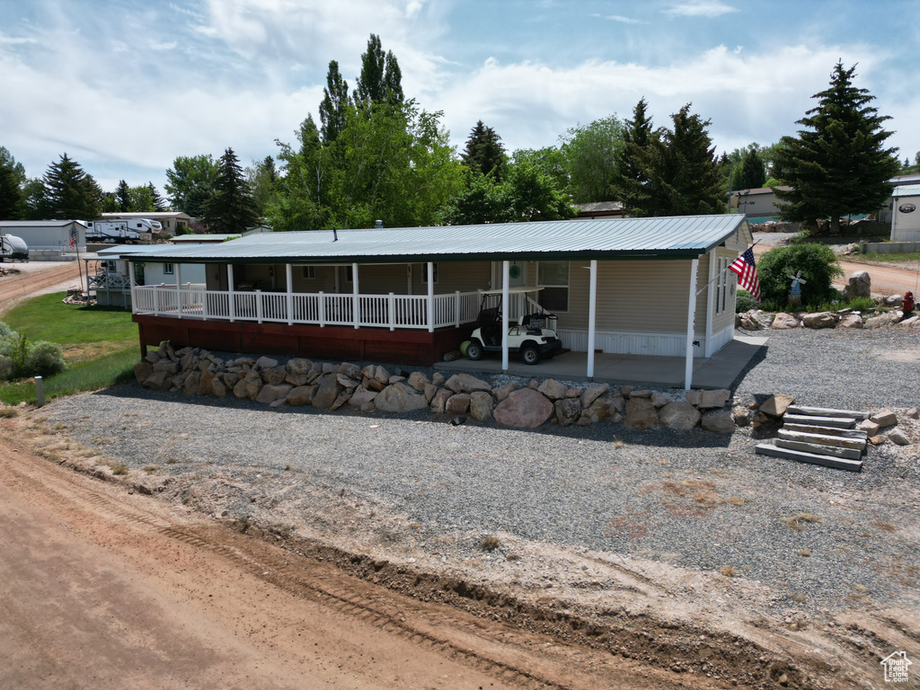 View of front of house featuring a metal roof