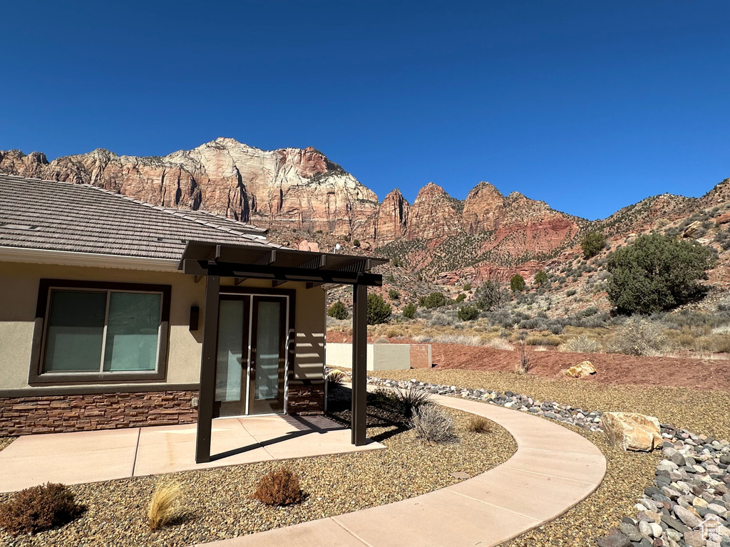 View of patio / terrace featuring a mountain view