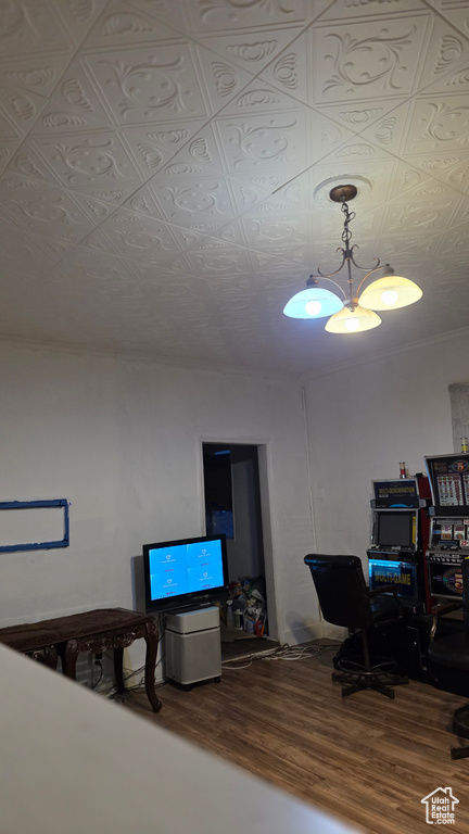 Office space featuring wood finished floors