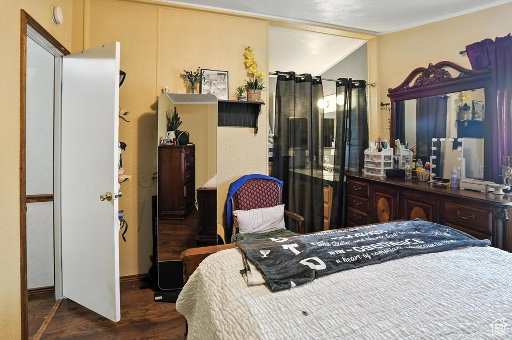 Bedroom featuring wood finished floors