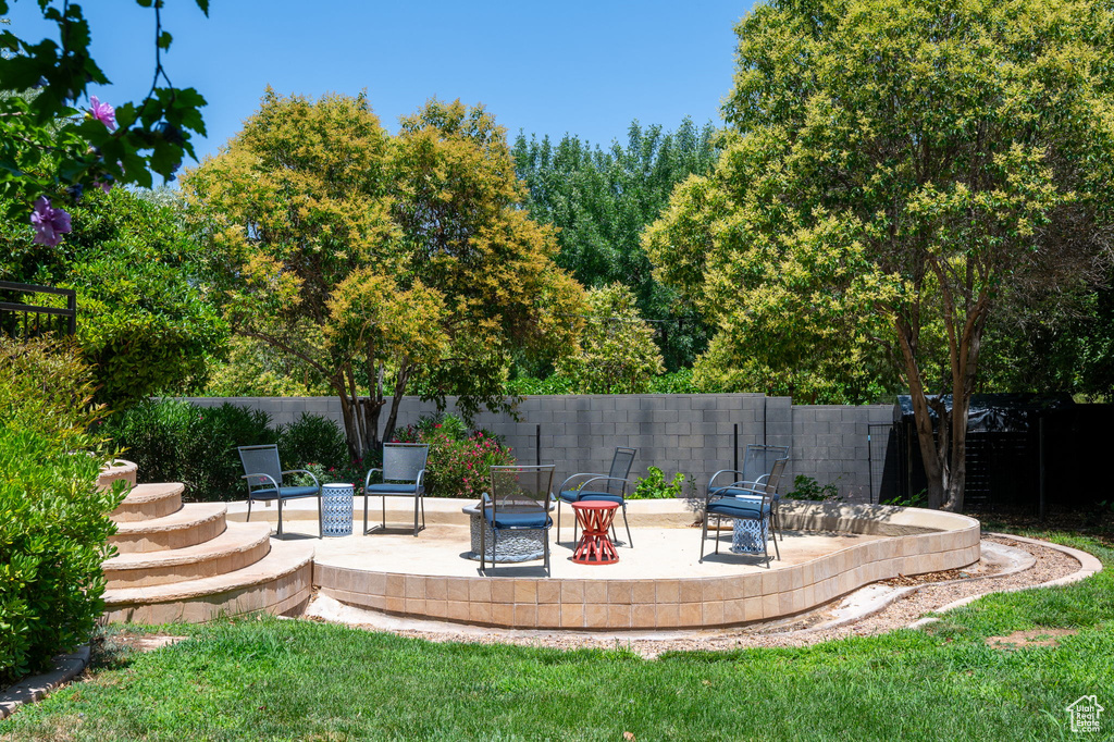 View of yard with a patio area