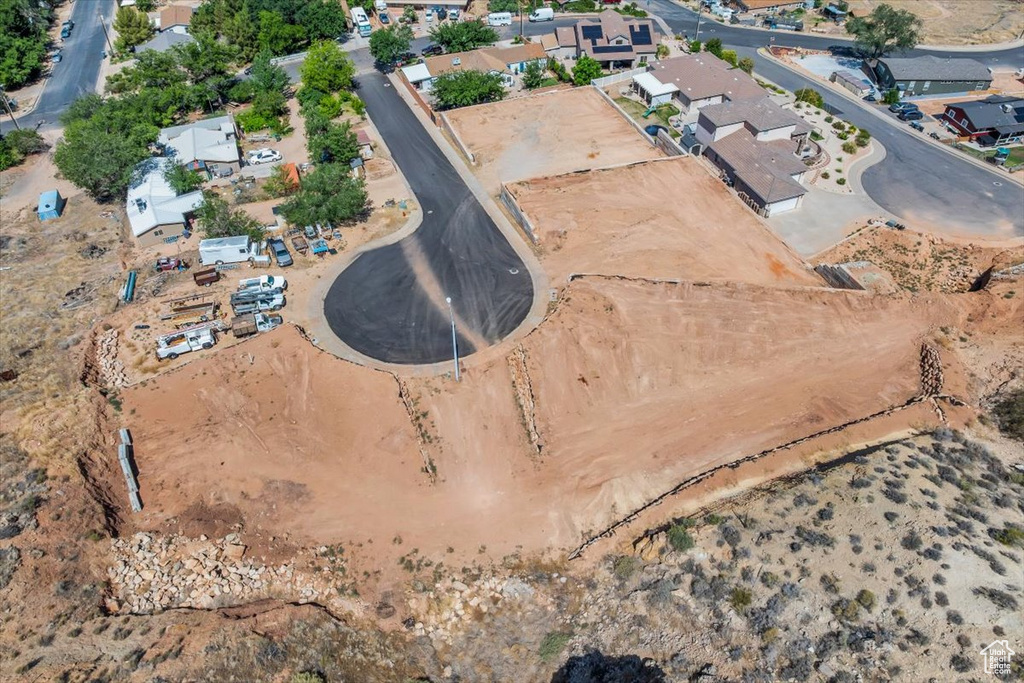 Aerial overview of property's location featuring nearby suburban area