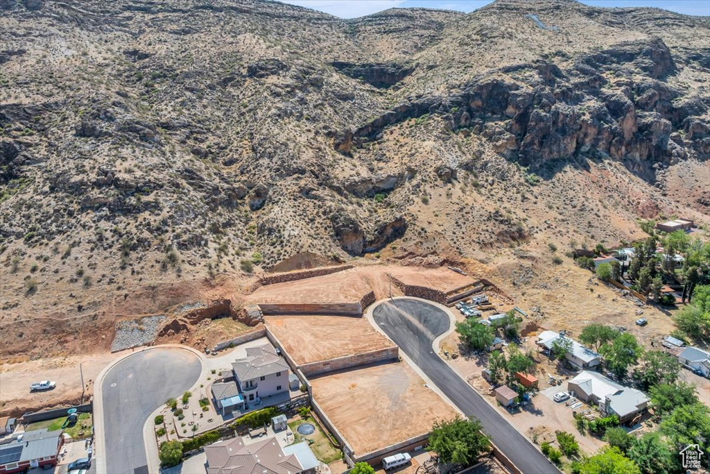 View of property location featuring a mountain backdrop and a desert landscape