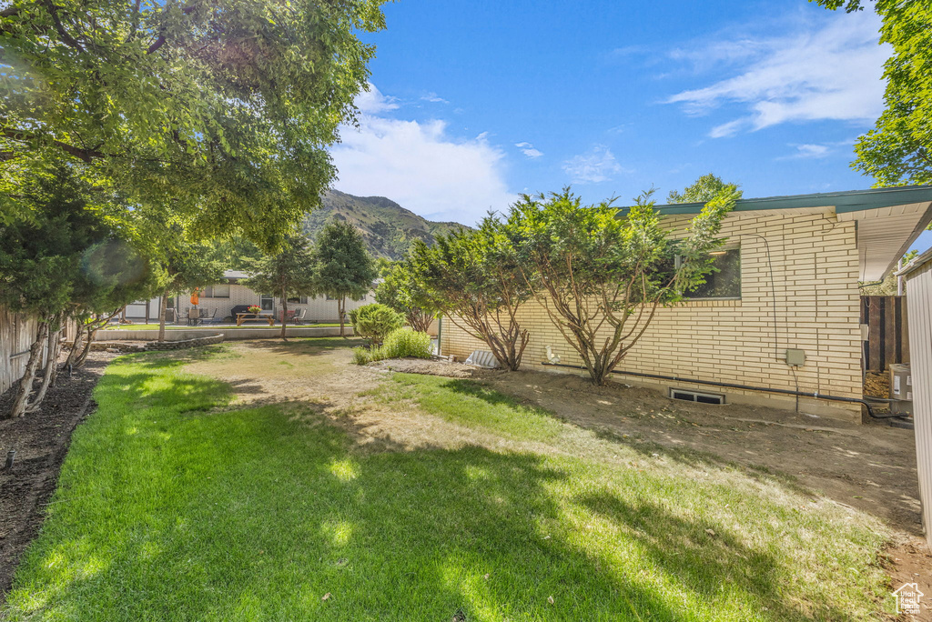 View of yard featuring a mountain view