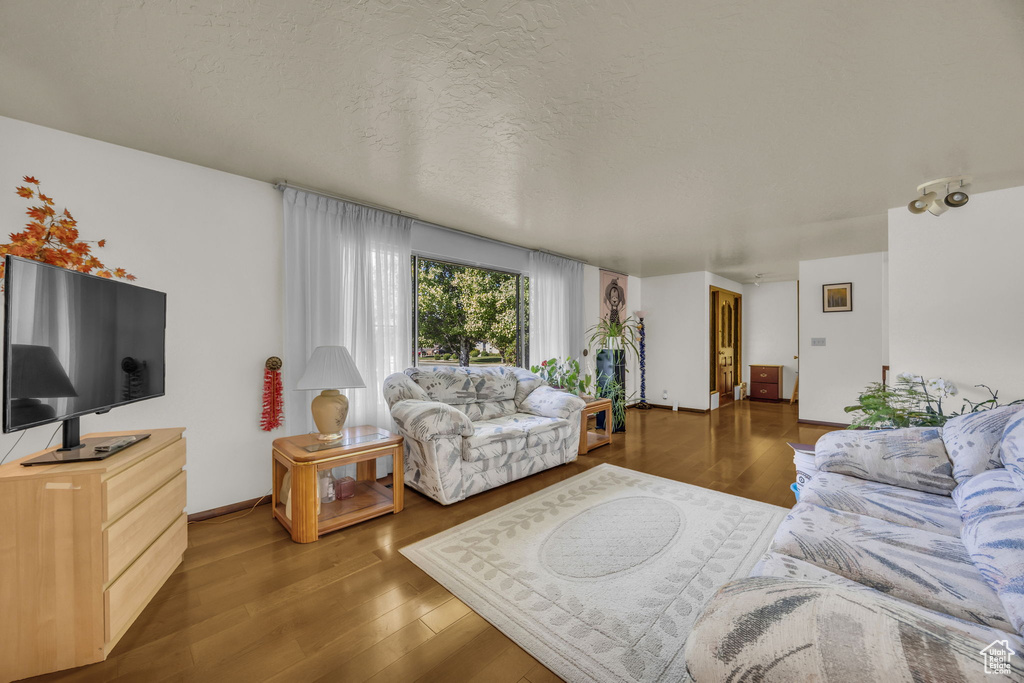 Living area with wood finished floors