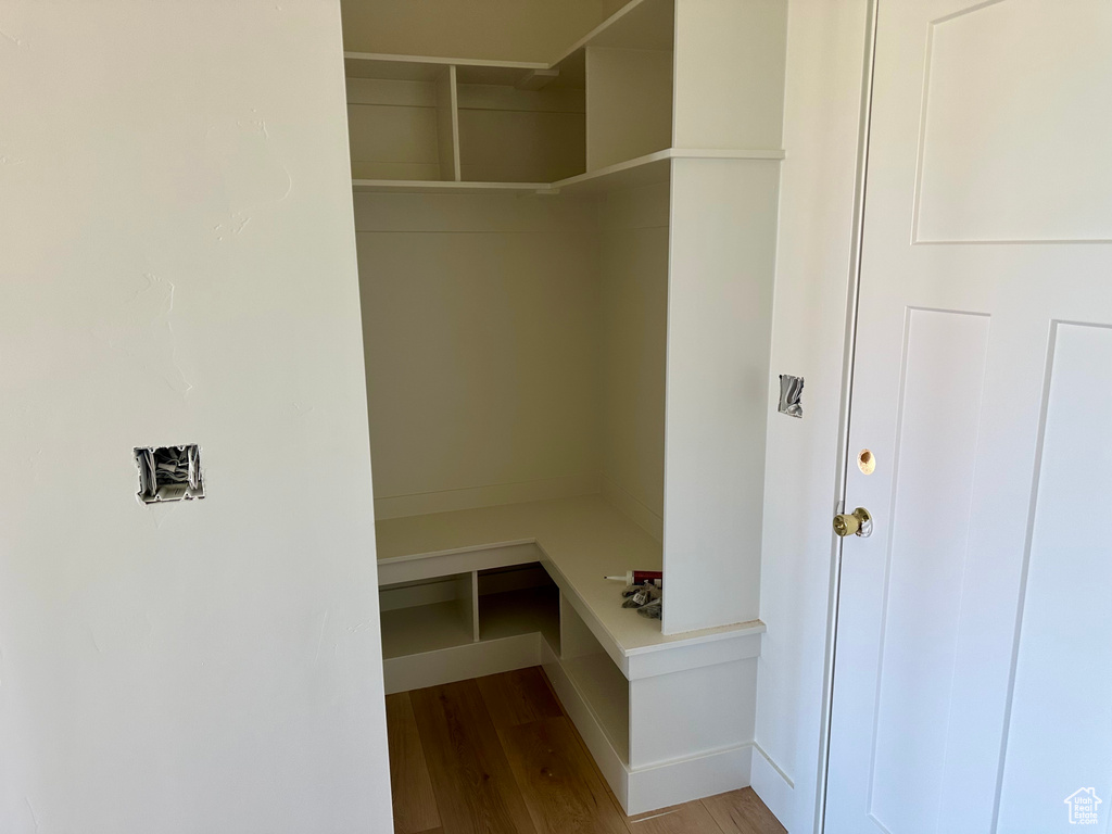 Mudroom with wood finished floors